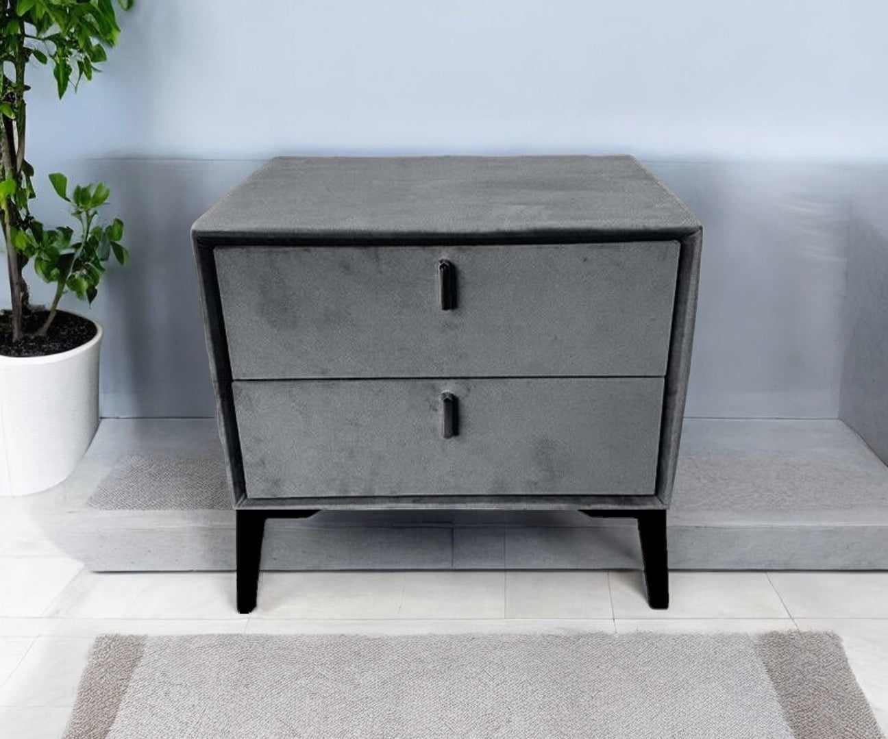 Grey velvet bedside table with silver legs