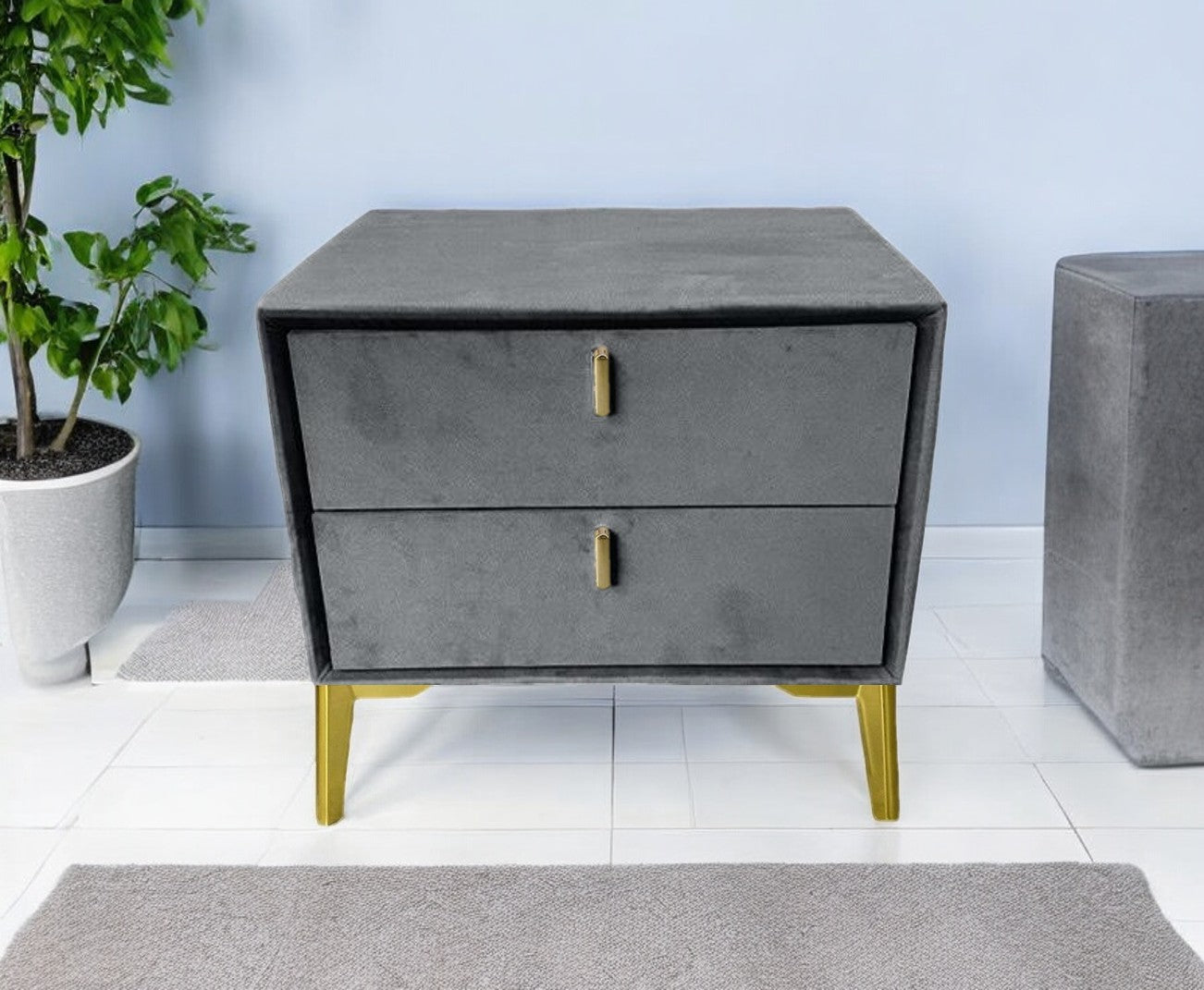 Grey velvet bedside table with silver legs