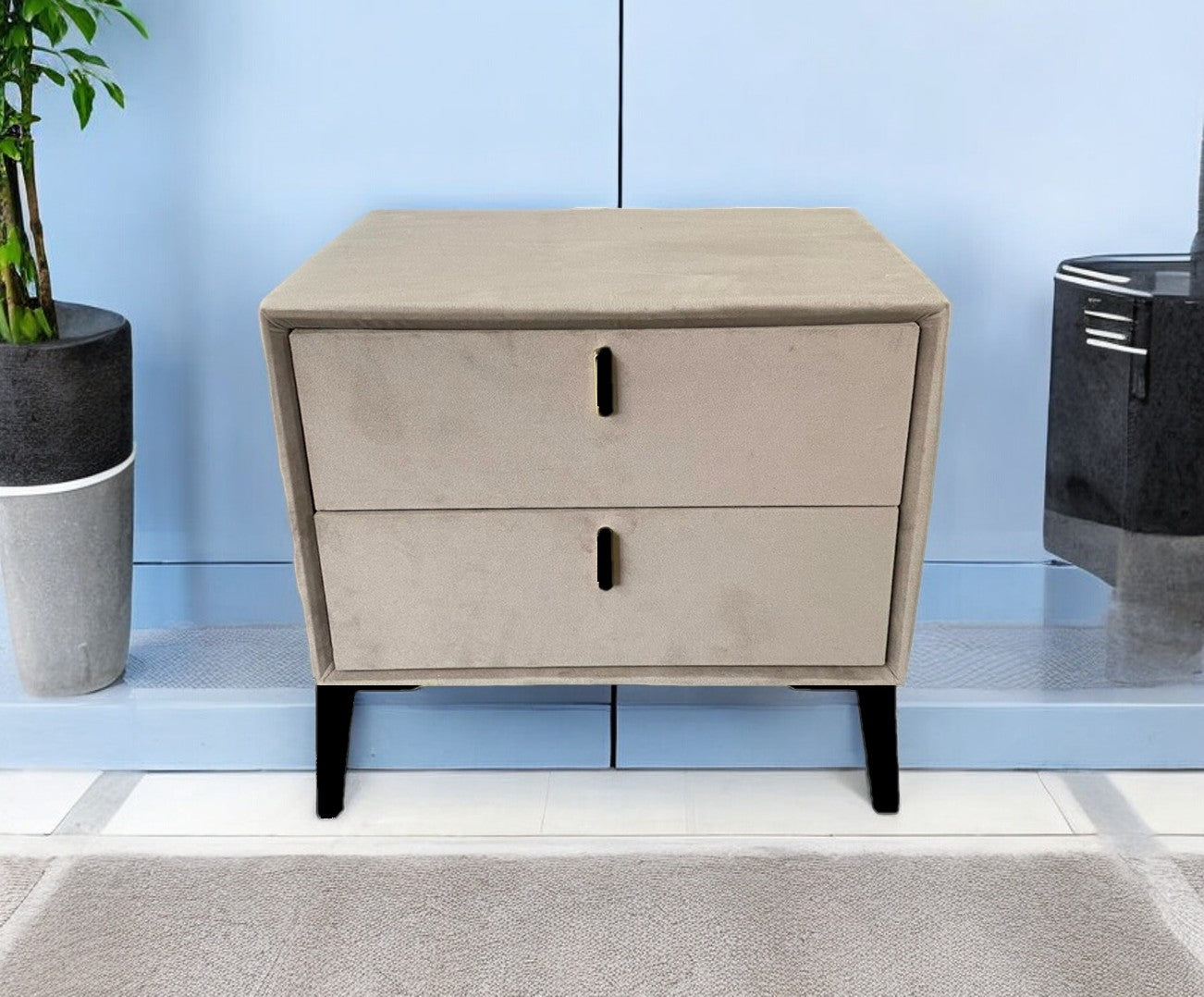 Black velvet bedside table with silver legs