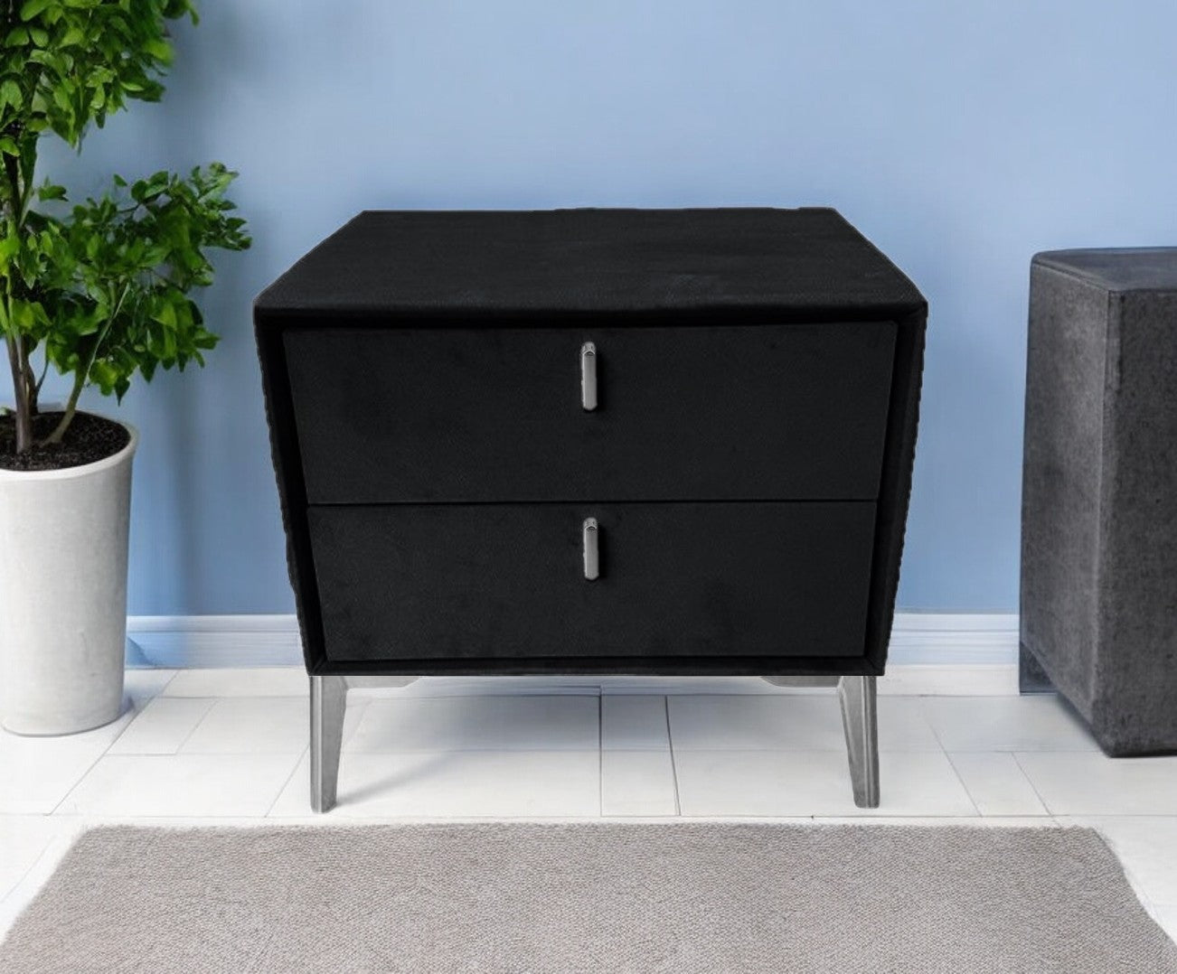 Black velvet bedside table with silver legs